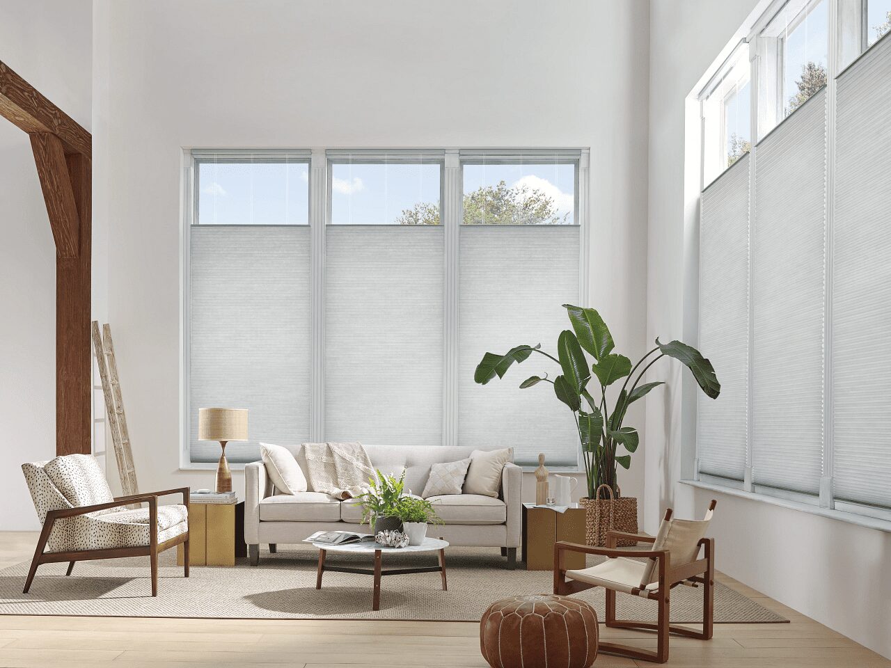 A living room with white walls and furniture.