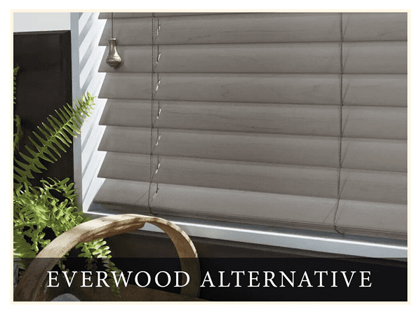 A close up of a window with blinds