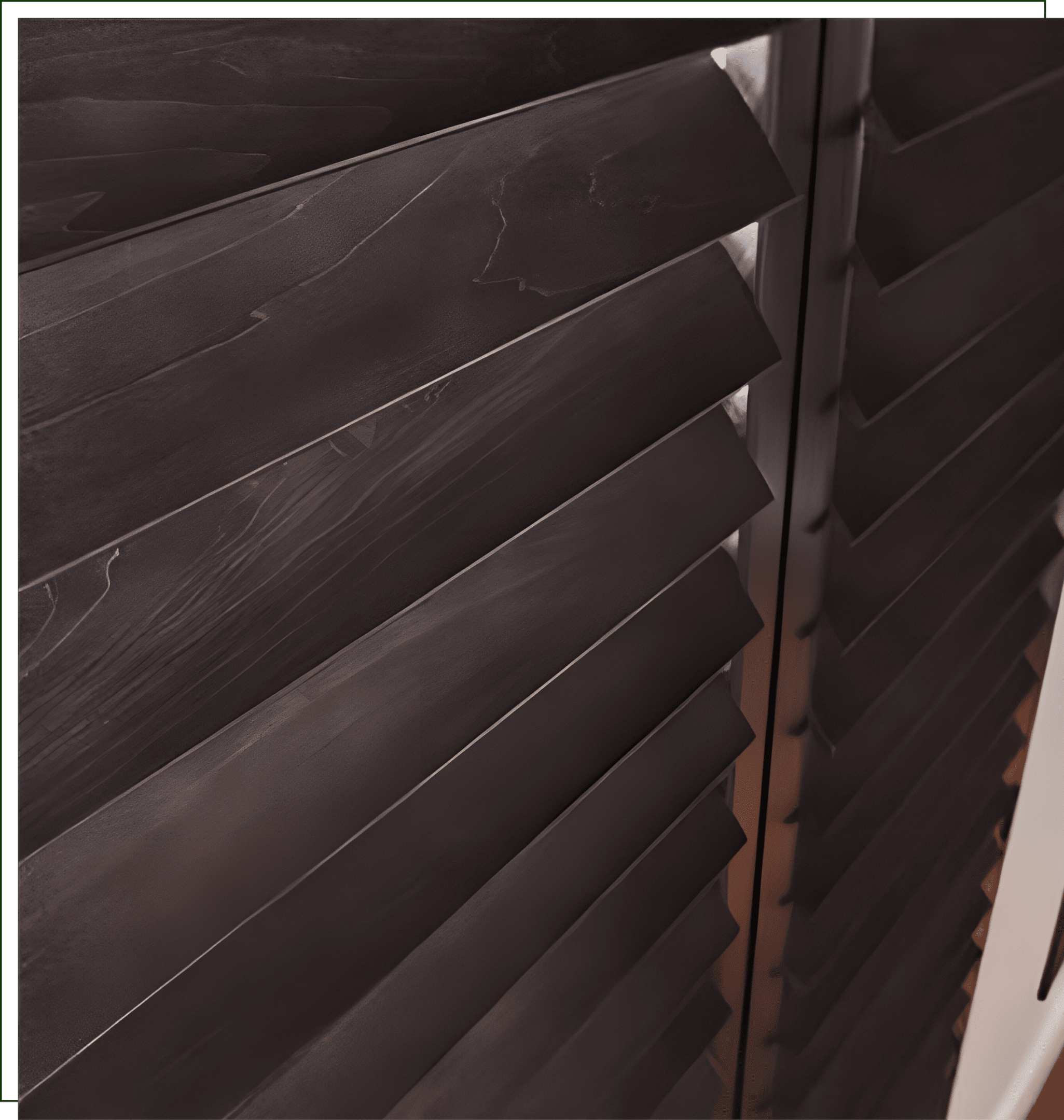 A close up of the wood slats on a window.