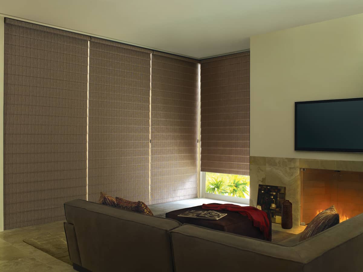 A living room with a couch and fireplace