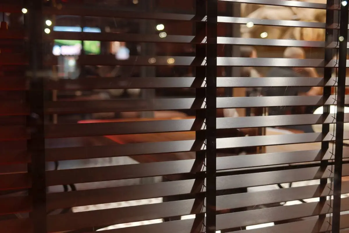 Downtown Southlake, TX, restaurant with commercial window blinds.