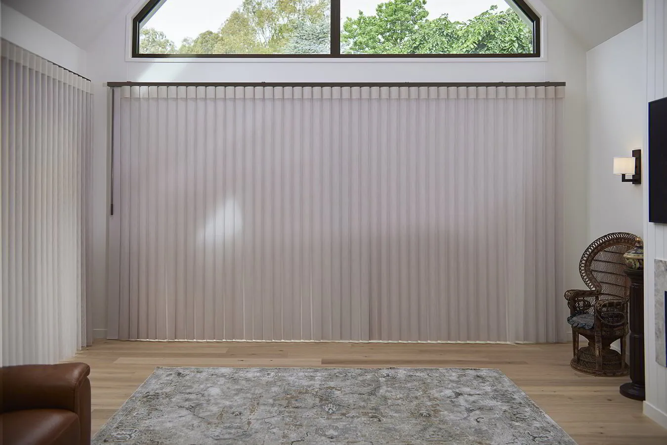 Living room with large closed vertical blinds